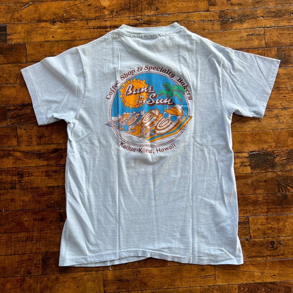 Vintage “Buns in the sun” Hawaiian graphic tshirt, marked as a size medium